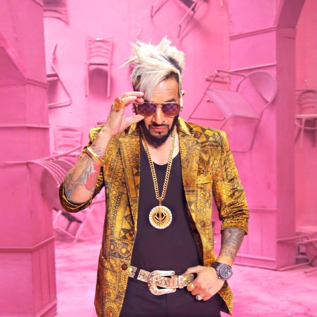 A gold-jacket promotional portrait.