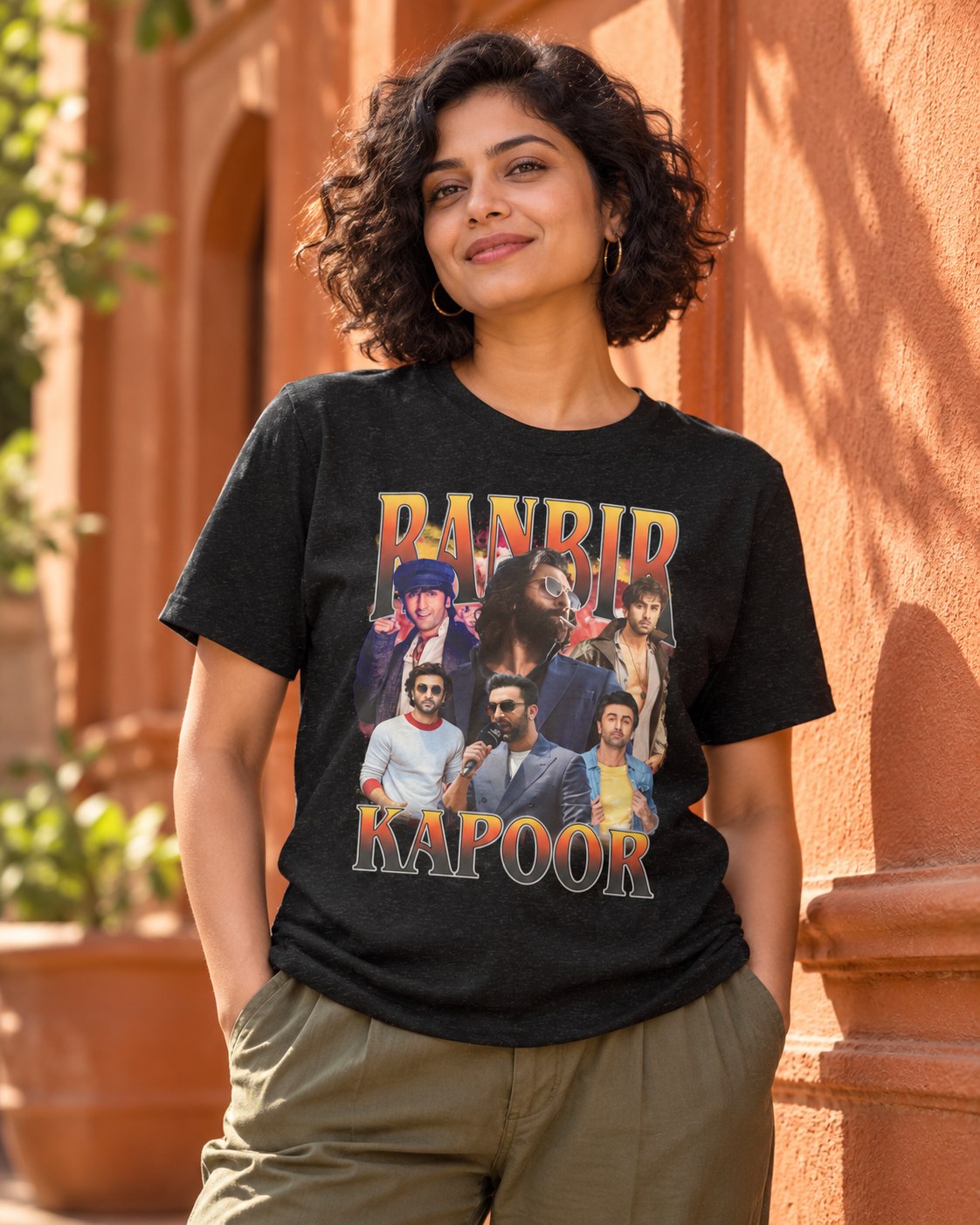 Styled mockup of Ranbir Kapoor The Versatile Bollywood Actor Redefining Charm And Style - Unisex t-shirt worn by a model